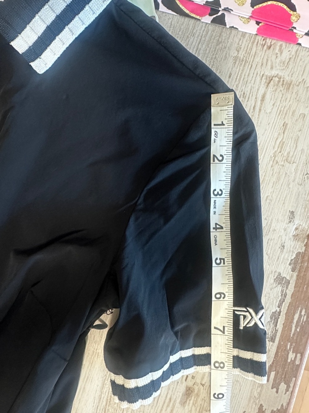 PXG Black Polo with White Accents - Picture 12 of 15
